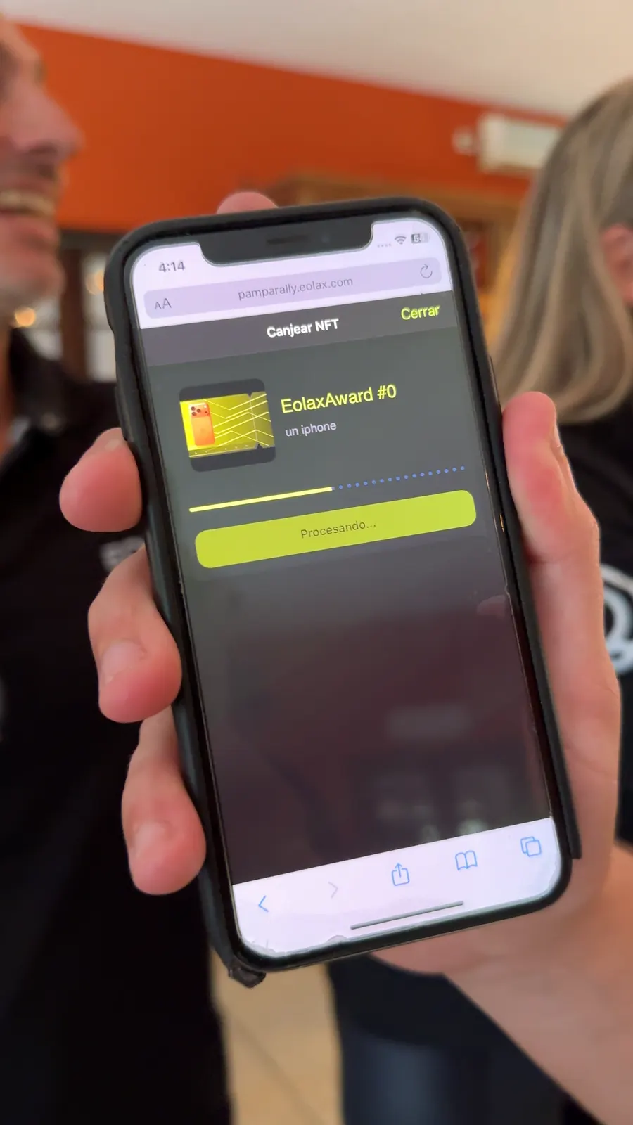 The redemption screen on the platform: the EolaxAward #0 collectible and the button to exchange it for the iPhone.